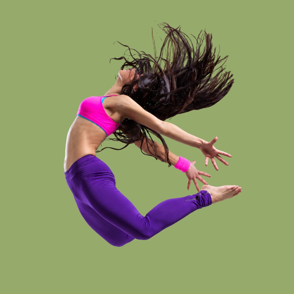 Woman leaping with energy